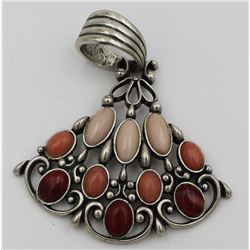 CAROLYN POLLACK PENDANT. PINK, ORANGE AND RED STONES.