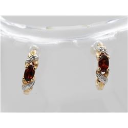 DIAMOND AND RUBY GOLD TONED STERLING SILVER EARRINGS.