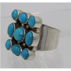 STERLING SILVER RING WITH 9 TURQUOISE STONES