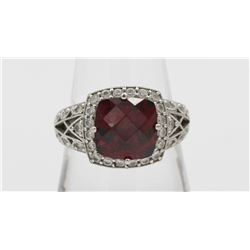 JUDITH RIPKA STERLING SILVER RING WITH CZ'S.