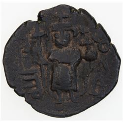 ARAB-BYZANTINE: Standing Emperor, ca. 670-690, AE fals (4.29g), Ba'albakk (Emisos), ND. VF