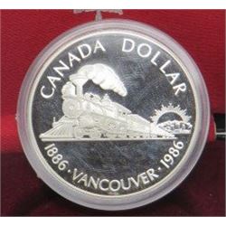 1986 CNDN SILVER DOLLAR VANCOUVER COIN