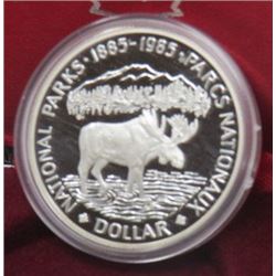 1985 CNDN SILVER DOLLAR PARKS COIN