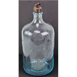 Early glass water bottle embossed International
