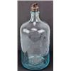Image 1 : Early glass water bottle embossed International