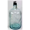 Image 2 : Early glass water bottle embossed International