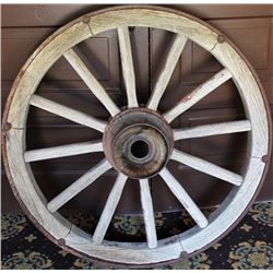 Heavy antique wagon wheel, very good tight