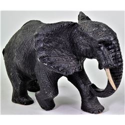 Large vintage carved stone bull elephant