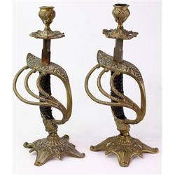 Early pair sword candle sticks most likely