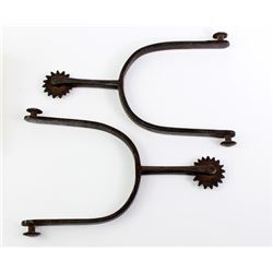 Early handforged iron spurs