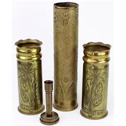 Collection of 4 brass cartridge trench art
