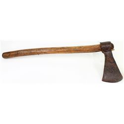 Early trade axe with handle intact