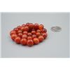 Image 4 : A 32-Bead Old Nanjiang Red Agate.