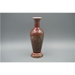 A Qing Dynasty Red Glazed Vase with Original Stand.