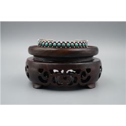A 19th Century Silver Bracelet with Turquoise Inlay.