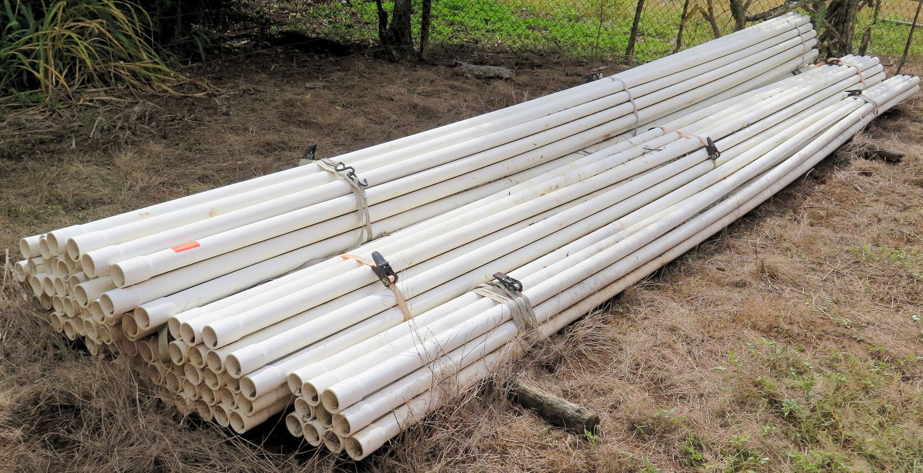 Bundle of PVC Pipes, Approx. 20' Length, Approx Qty 100 - Oahu Auctions