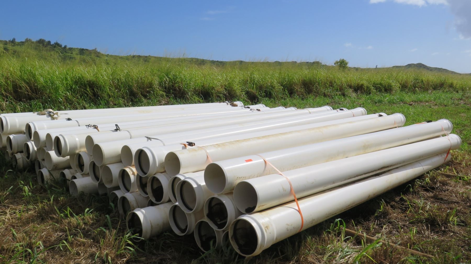 Multiple Bundles of 250mm (Metric) White PVC Pipes 20'4