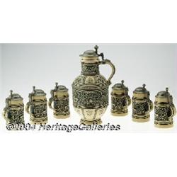 A GERMAN BEER STEIN AND PITCHER SET
