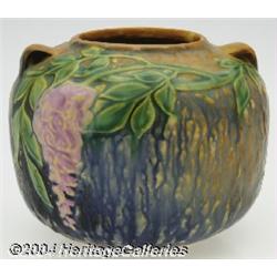 Roseville: A WISTERIA BLUE AMERICAN POTTERY VESSEL (Roseville)