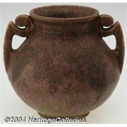 Roseville: A CARNELIAN II AMERICAN POTTERY BULBOUS TWO-HANDLED VASE (Roseville)