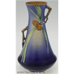 Roseville: A PINE CONE BLUE AMERICAN POTTERY CORSETED VASE (Roseville)