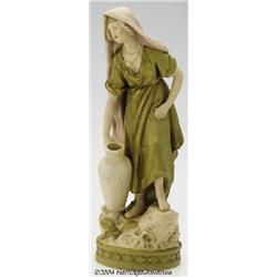 Royal Dux: A CONTINENTAL PORCELAIN FIGURINE (Royal Dux)