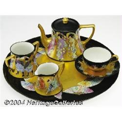 Limoges: A FRENCH PORCELAIN TEA SET (Limoges)