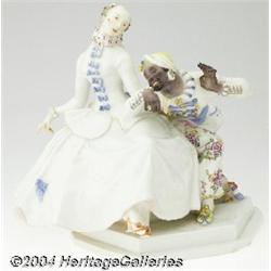 Meissen: A 'LADY AND THE MOOR' GERMAN PORCELAIN FIGURINE (Meissen)