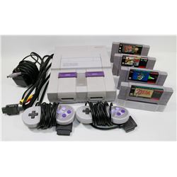 SUPER NINTENDO CONSOLE WITH 4 GAMES, TWO