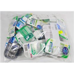 BAG OF DENTAL CARE ITEMS