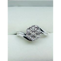 25) STERLING SILVER 7 DIAMONDS RING