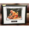 Image 1 : GEORGES ST.PIERRE SIGNED,FRAMED PHOTO