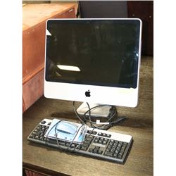 APPLE COMPUTER WITH KEYBOARD AND MOUSE.