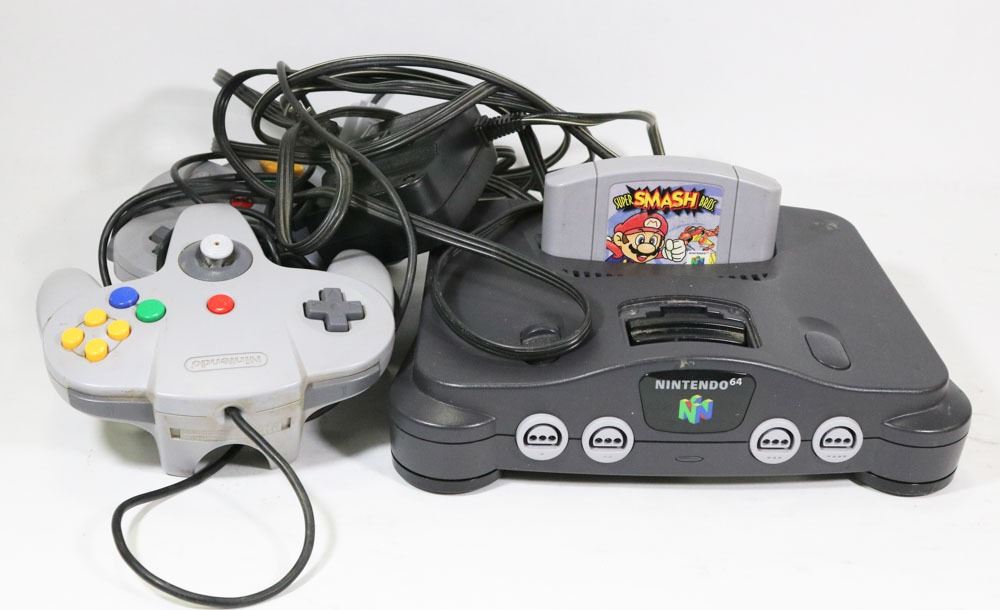 NINTENDO 64 WITH 2 CONTROLLERS, CORDS, AND 1 GAME. - Kastner Auctions nintendo 64 with 2 controllers