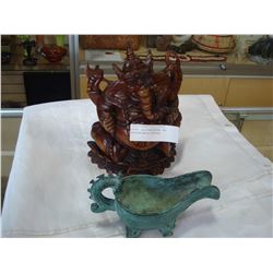 CARVED EASTERN FIGURE AND EASTERN METAL PITCHER