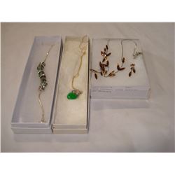 JADE PENDENT, CHARM BRACELET AND NECKLACE