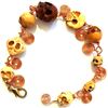 Image 2 : Hand-carved Skull Bead & Copper Wire Bracelet