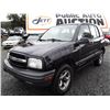 Image 1 : J2 --  1999 Chevrolet Tracker  , Black , 213076  KM's