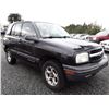 Image 2 : J2 --  1999 Chevrolet Tracker  , Black , 213076  KM's