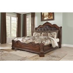 BRAND NEW ASHLEY SIGNATURE KINGSIZE BEDFRAME, DARK FINISH, CARVED WITH TUFTED BROWN LEATHER, RETAIL 