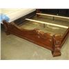 Image 2 : BRAND NEW ASHLEY SIGNATURE KINGSIZE BEDFRAME, DARK FINISH, CARVED WITH TUFTED BROWN LEATHER, RETAIL 