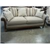 Image 2 : BRAND NEW ASHLEY SIGNATURE SOFA WITH DOWN FILLED CUSHIONS AND WOOD TRIM, THROW PILLOWS, RETAIL $2899