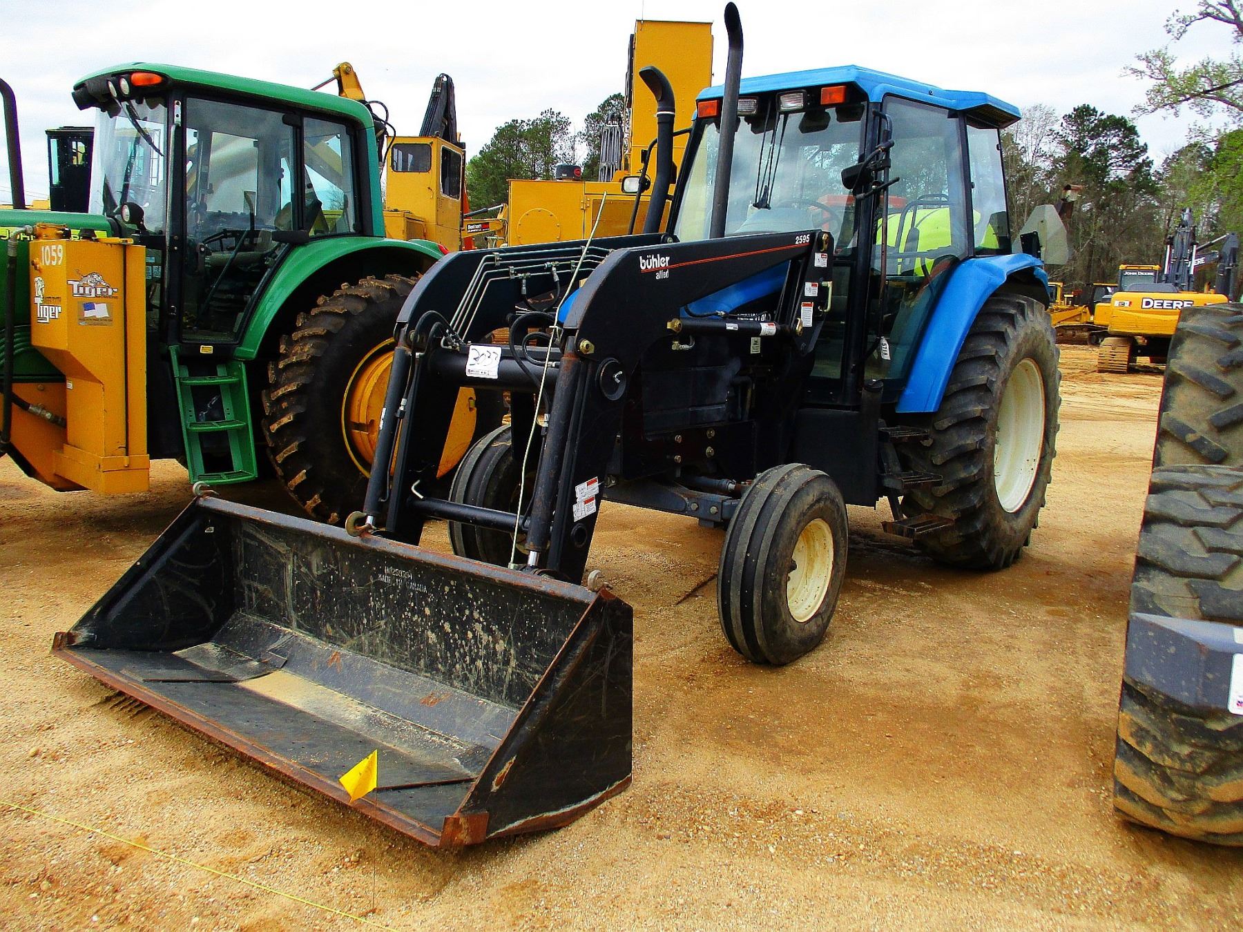 NEW HOLLAND TS110 FARM TRACTOR, VIN/SN100057B 2595 BUHLER ALLIED