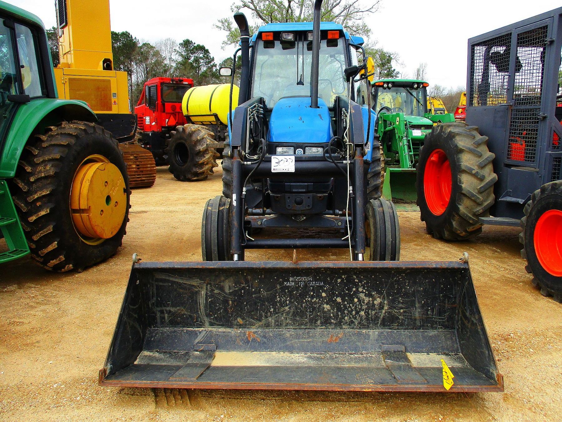 NEW HOLLAND TS110 FARM TRACTOR, VIN/SN100057B 2595 BUHLER ALLIED