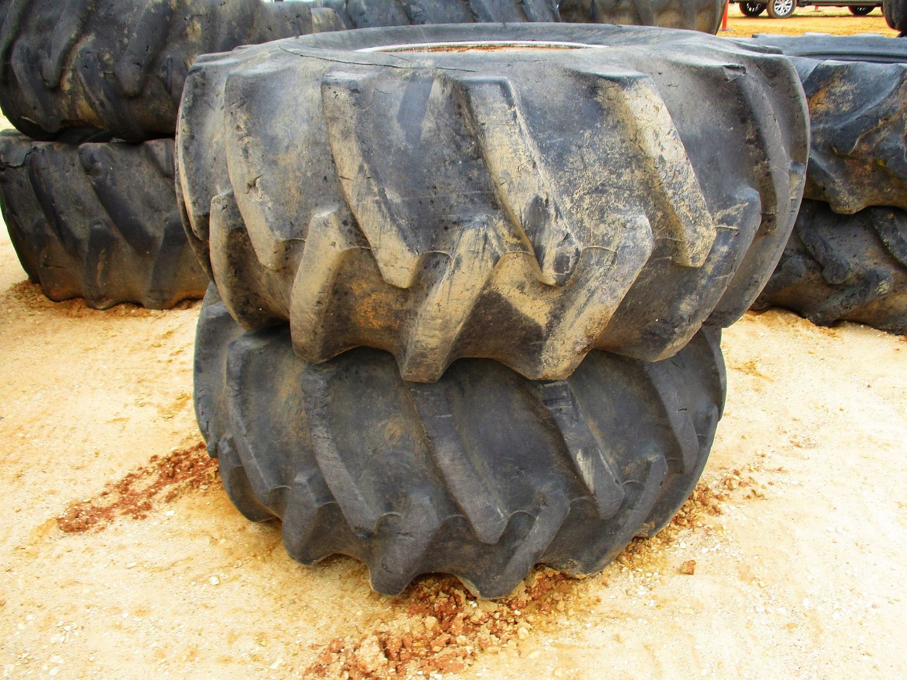 (2) 23.126 SKIDDER TIRES W/RIMS
