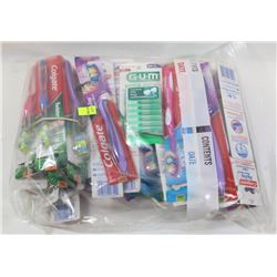 LARGE BAG OF TOOTHBRUSHES AND OTHER DENTAL