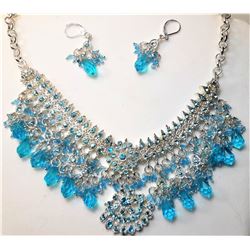 24)  SILVER TONE & BLUE CRYSTAL STATEMENT