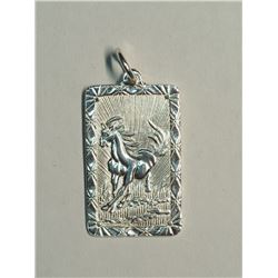 58) STERLING SILVER PENDANT