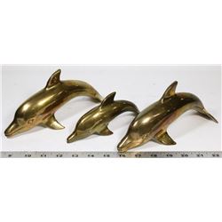 THREE SOLID BRASS DOLPHINS