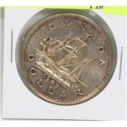 1949 CANADIAN SILVER DOLLAR COIN.